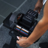 Close-up of the Sport 24 barbell attachment lock system on the adjustable dumbbells