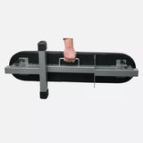 A hand holding the PowerBlock Travel Bench showing how easy it is to carry. powerblock-travel-bench-folded-held