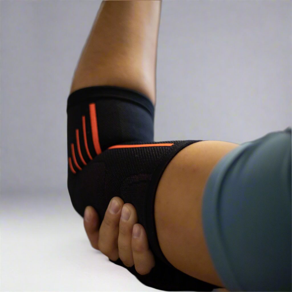 Compression Elbow Sleeve for a safe workout, in black color with orange detail