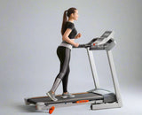 woman jogging on the StrideForge Treadmill profile photo