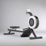 Modern black and white air rowing machine for full-body cardio and home fitness workouts.